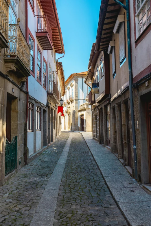 street with a stop sign that is out in the distance