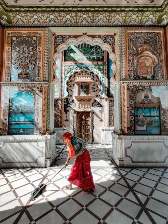 a woman is walking away from the building