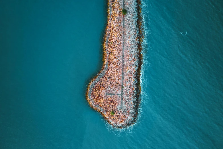 there is a very large rock in the water