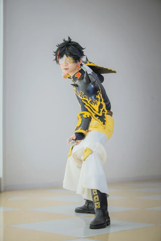 a male anime cosplay with hair in full costumes