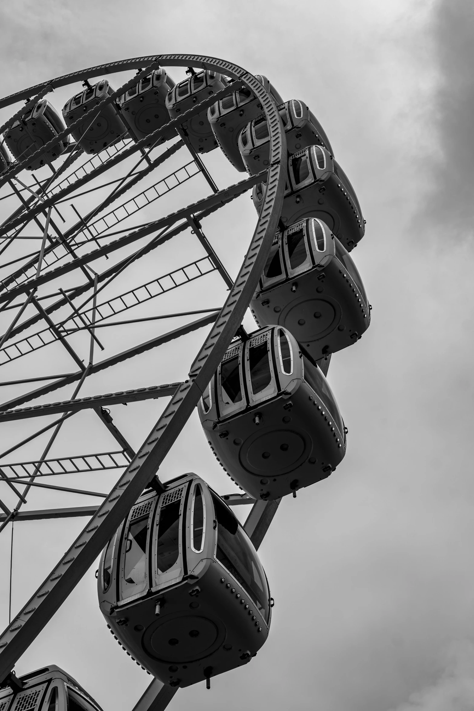 a large ferris wheel with several seats on it