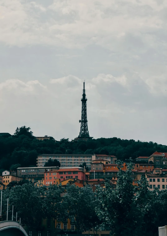 a small tower in the distance on a cityscape