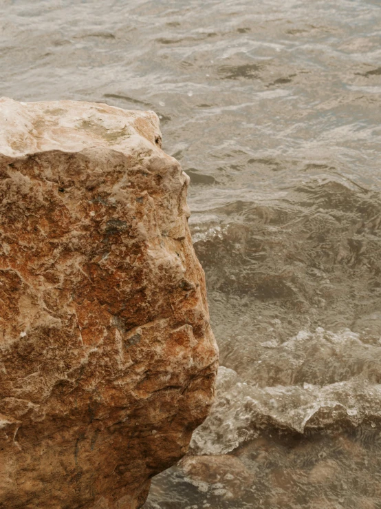 a very large rock out in the ocean