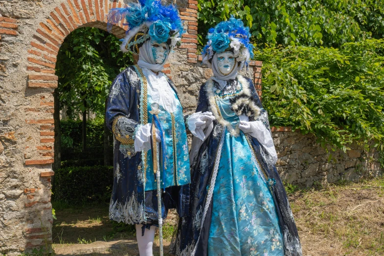 two people with their faces painted as if they are talking