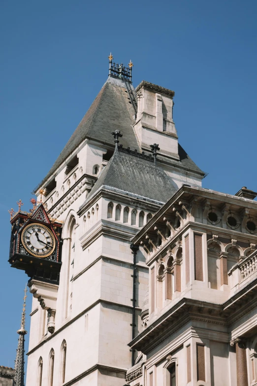 an old church building has a steeple and clock