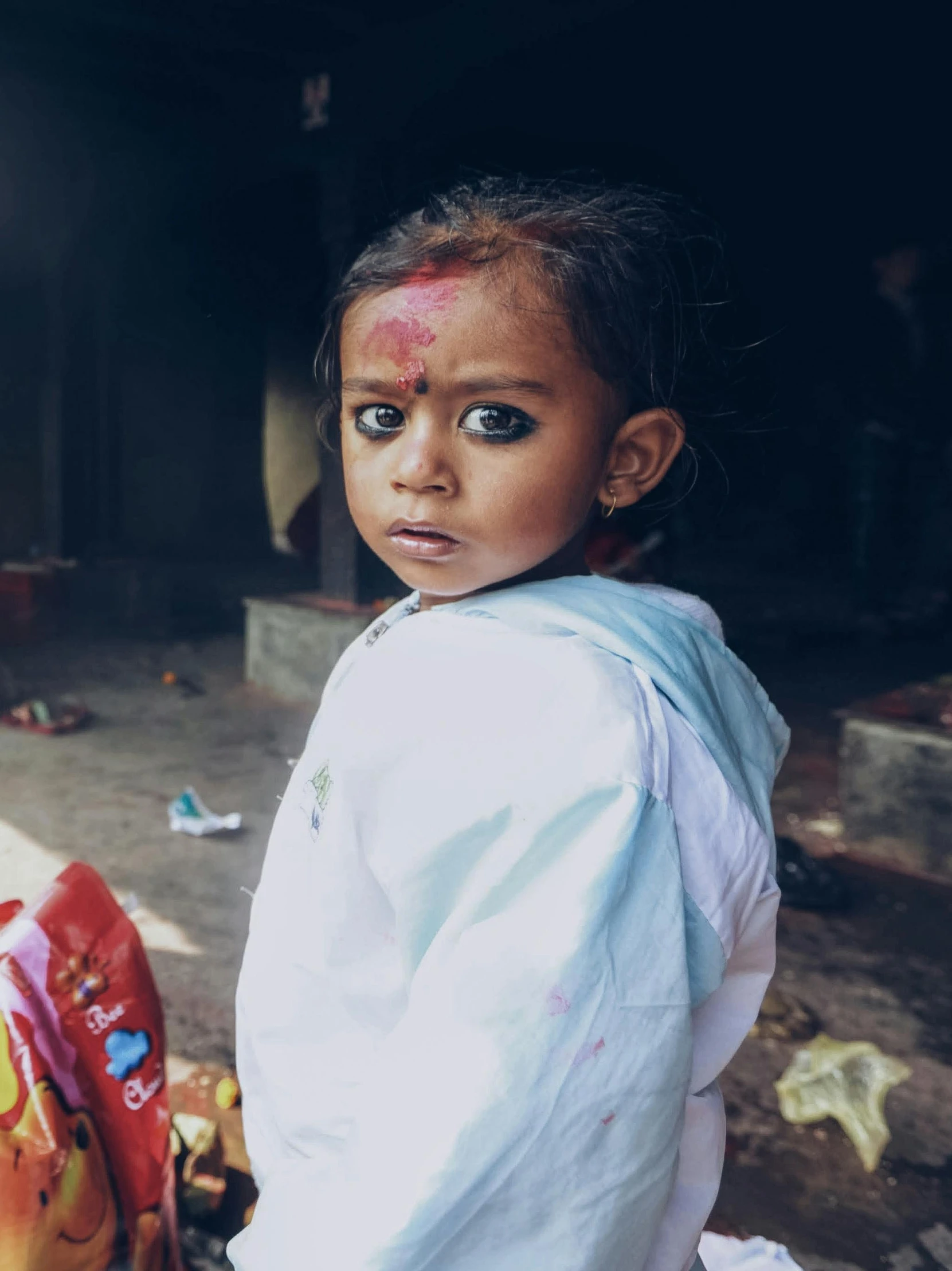  with face paint in an alley