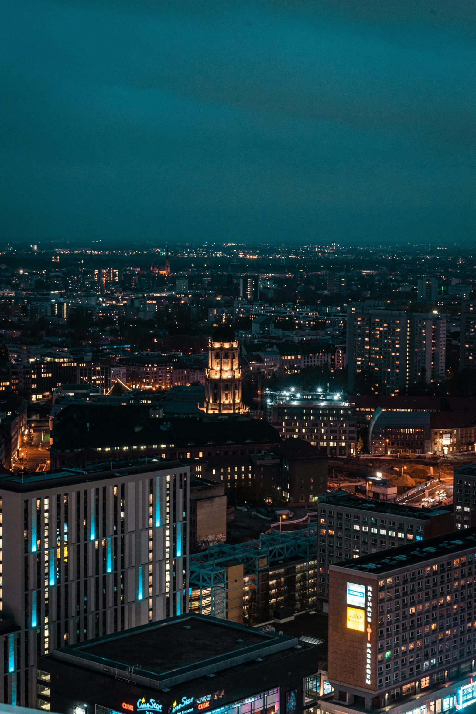 a large city is lit up at night