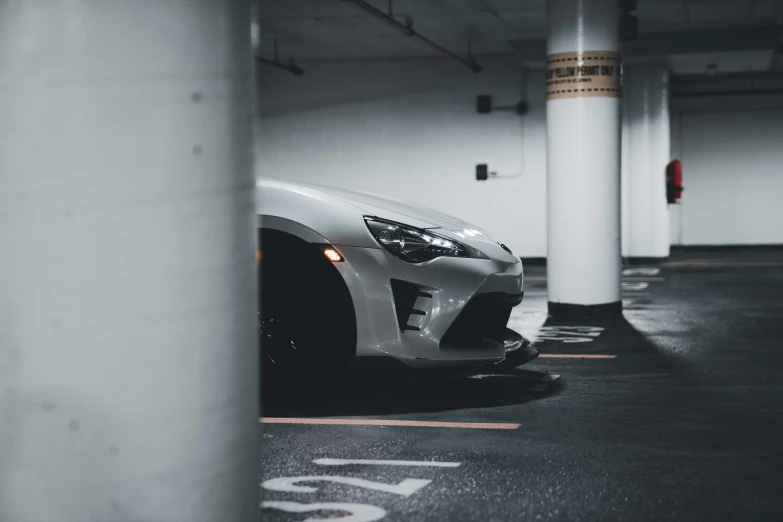 the front of a car parked at an underground space