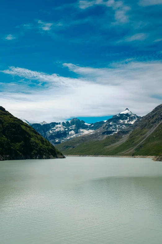 a large body of water surrounded by mountains