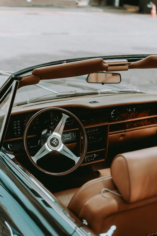 a convertible car with its dashboard, seats up