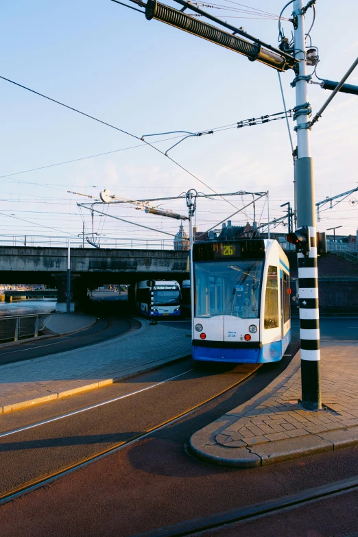 a public transit train traveling on tracks