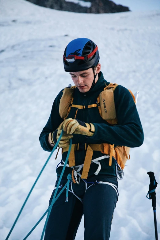 a person in the snow standing on a ski slope