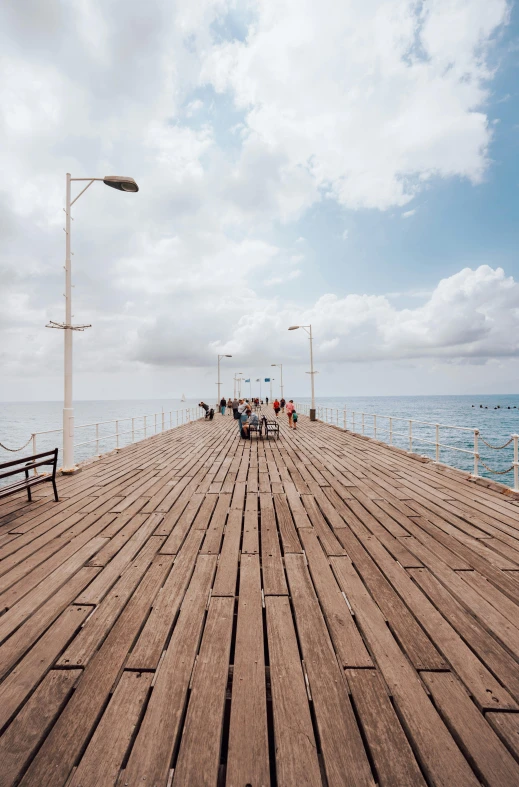 an image of a wood pier on the beach