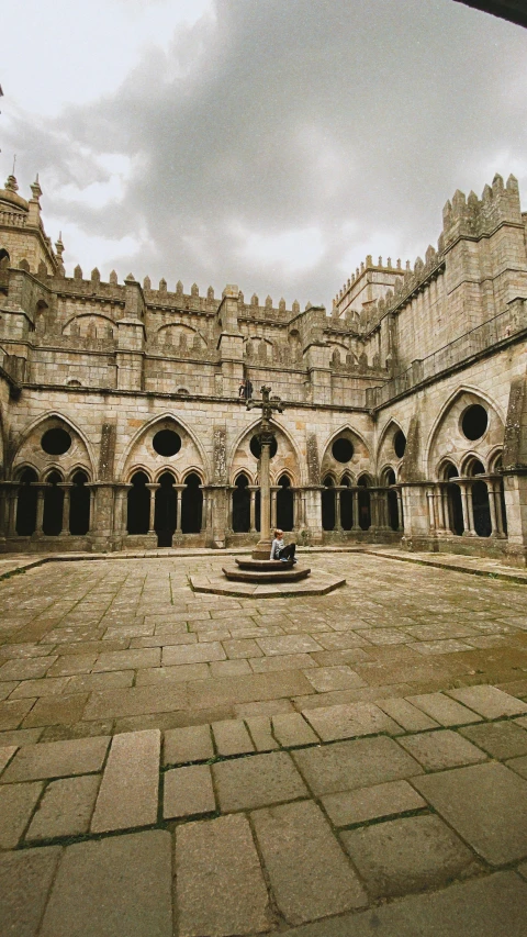 an old building with stone floors and arches