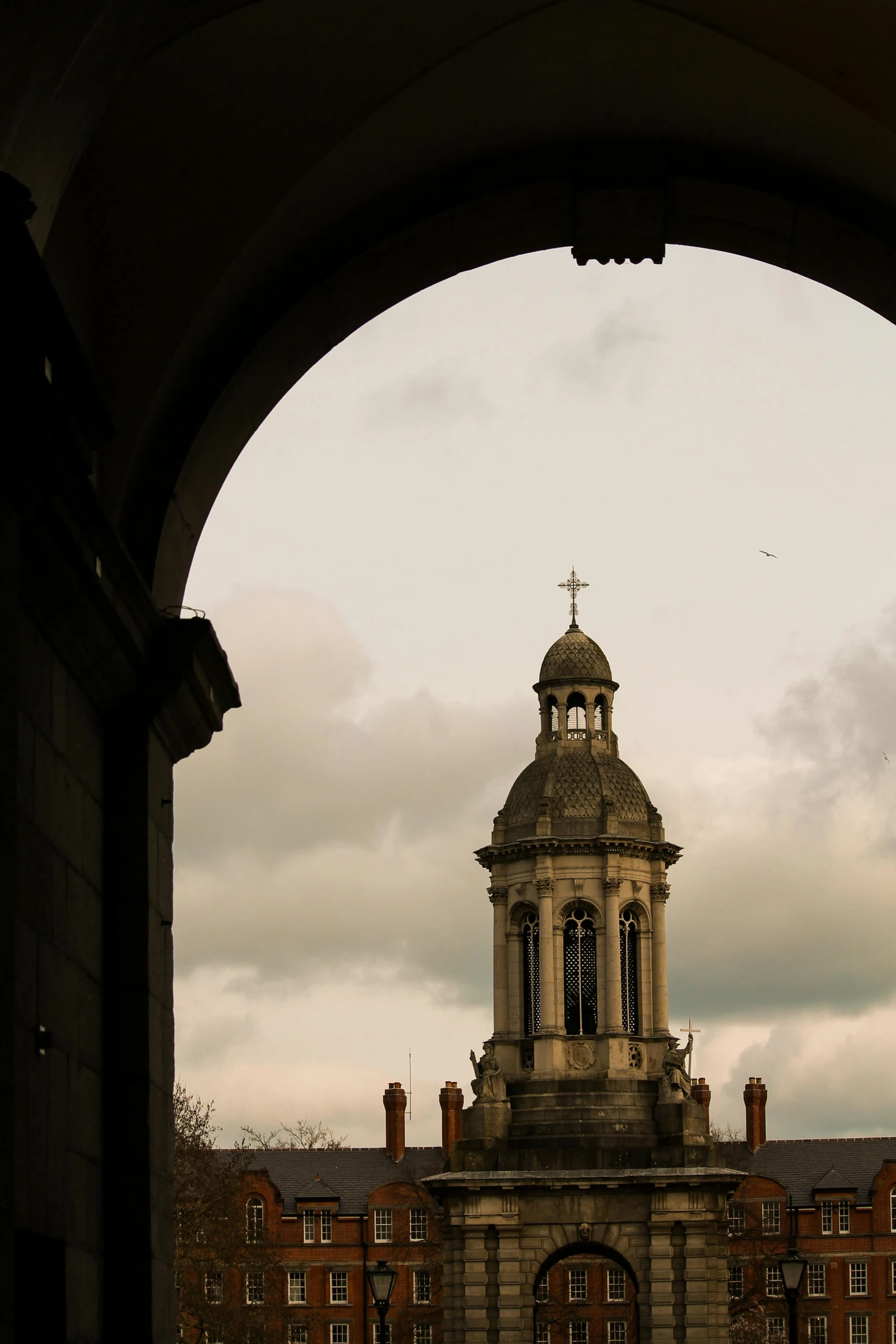 a po through an archway that is looking into the distance