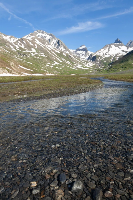 a view of a stream on a mountain pass