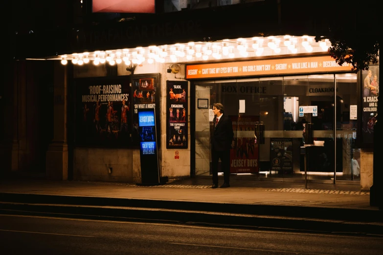 an asian shop is lit up and displays the latest item in it's display