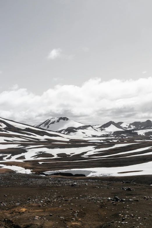 a long, thin hill with some very large mountains on top