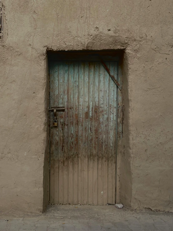 a door with a wood grill on the outside