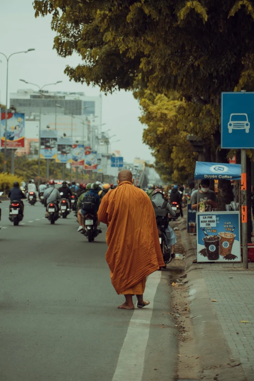 a person that is walking down the street