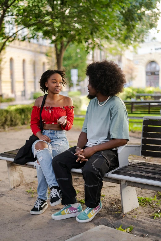 a person that is sitting on a bench