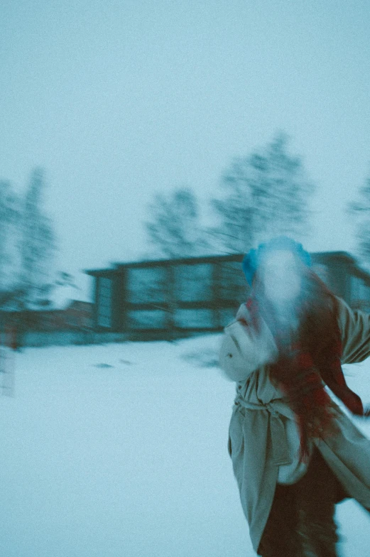 a person riding a snow board in the snow