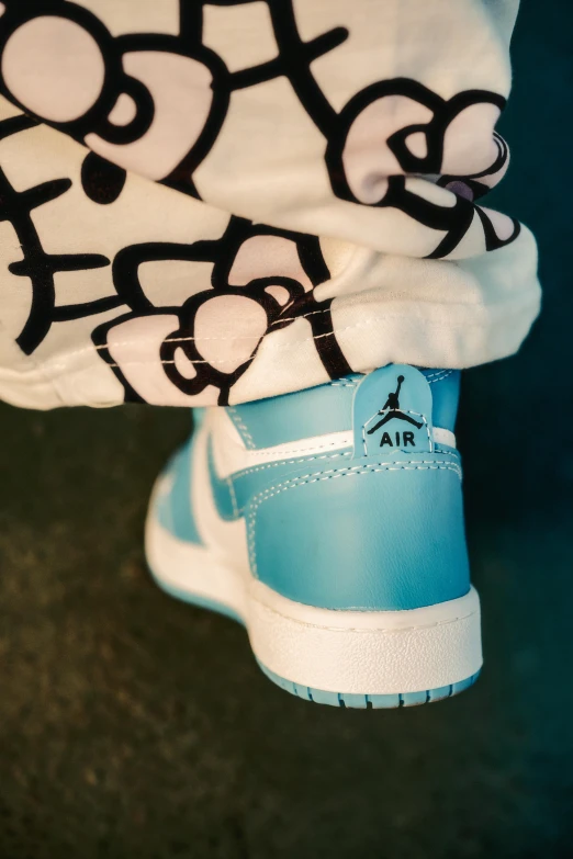 a baby blue air jordan sneakers is pictured