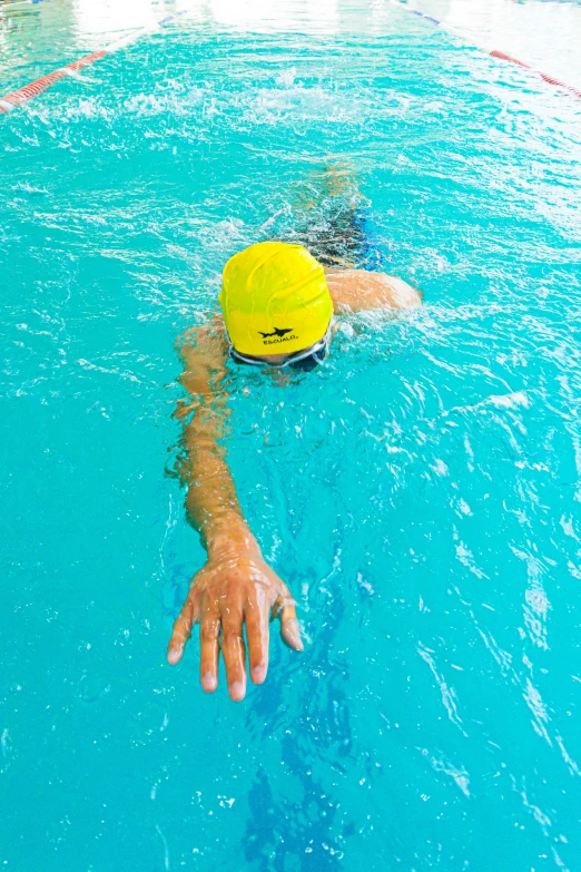 a person in the water with a ball