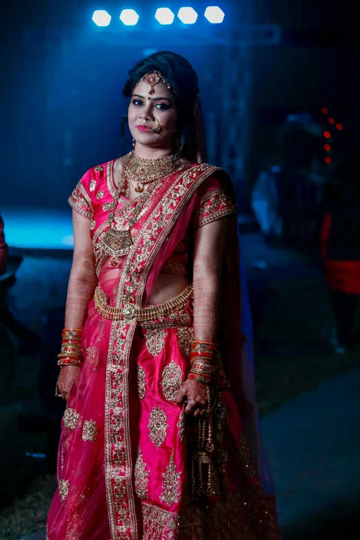 bride in pink lehenga during a wedding