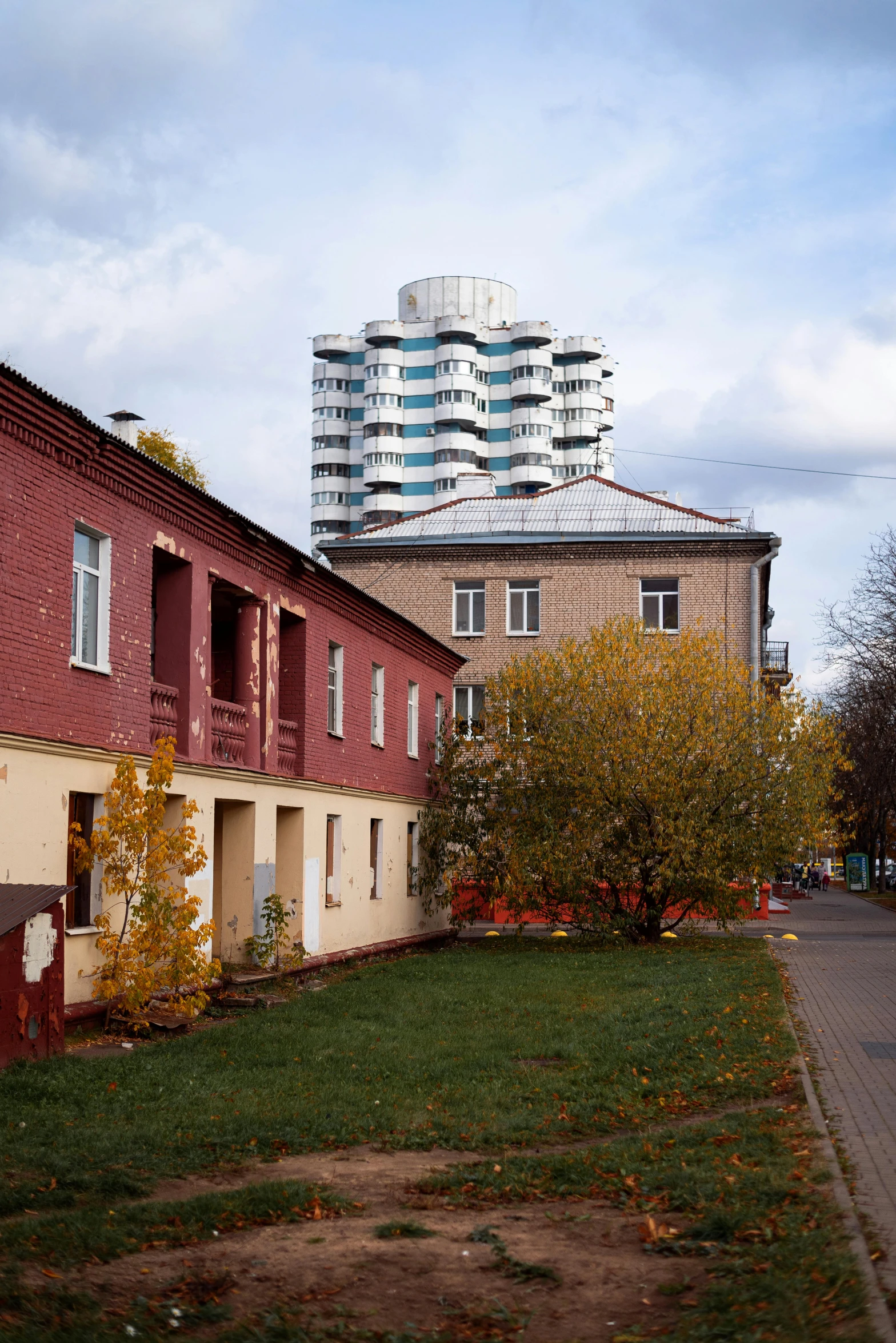 a red building with a tall tower behind it