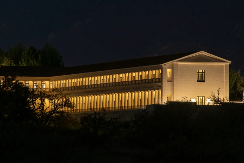 the building is illuminated up with bright lights