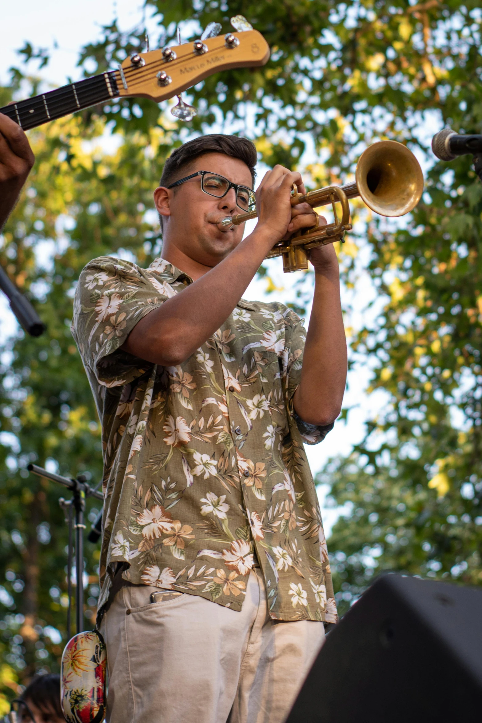 a man that is playing some kind of musical instrument