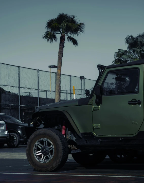 the jeep is in front of a high court fence