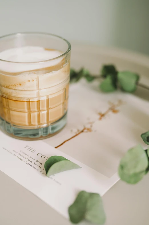 a glass that is sitting on top of a table