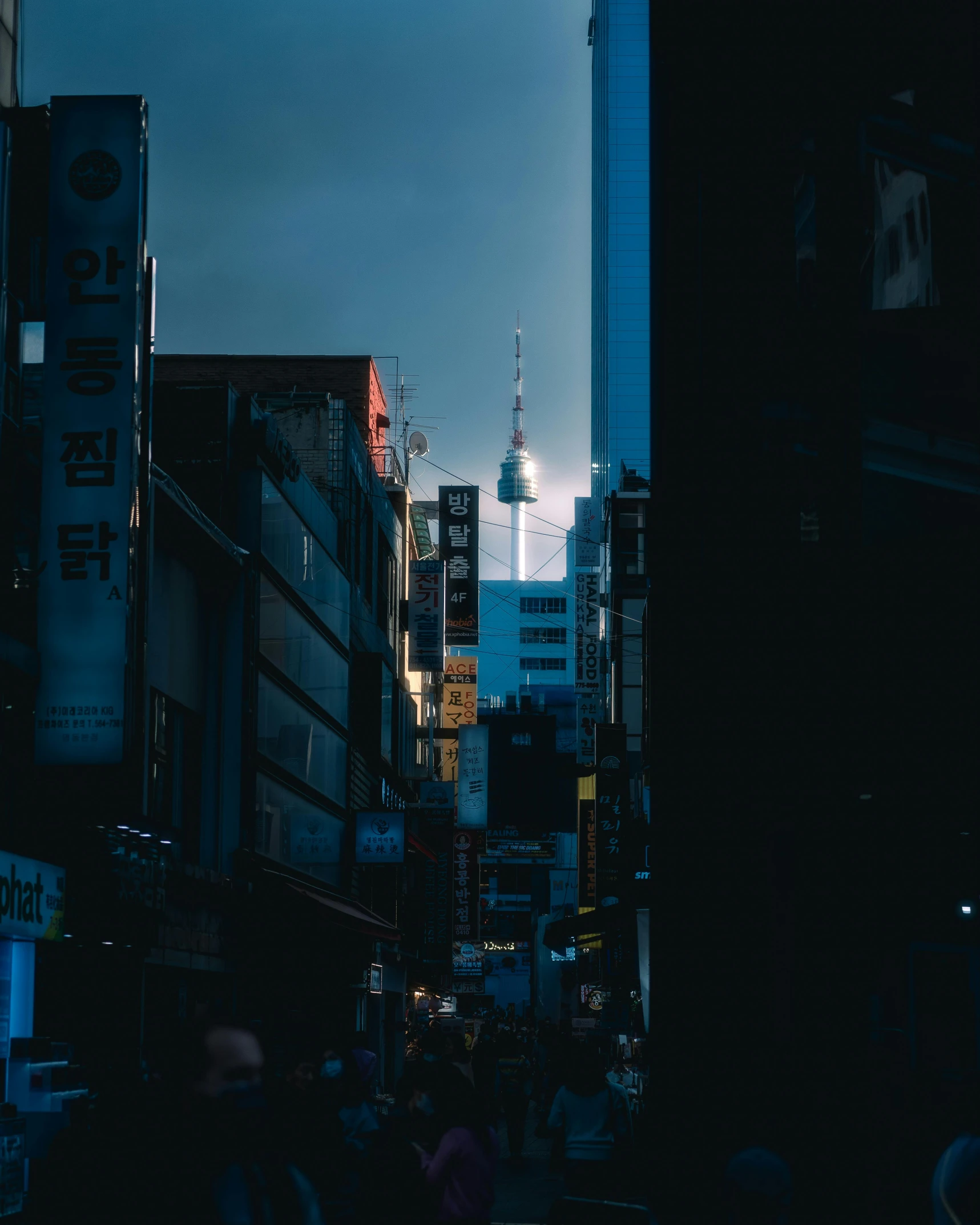 some very big city buildings and clouds