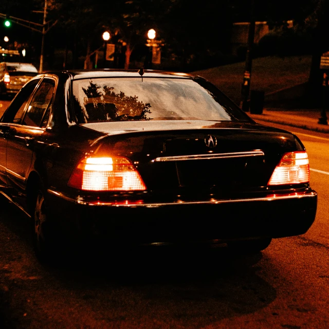 a couple of cars are stopped on the side of a street