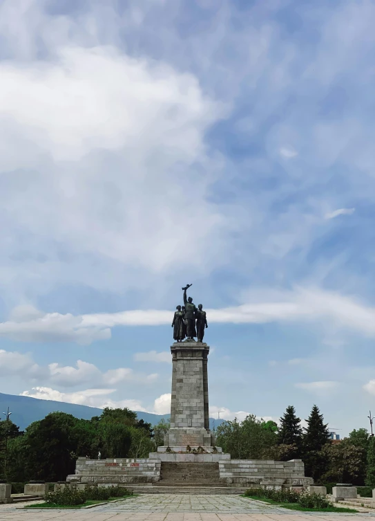 the monument sits under some blue skies