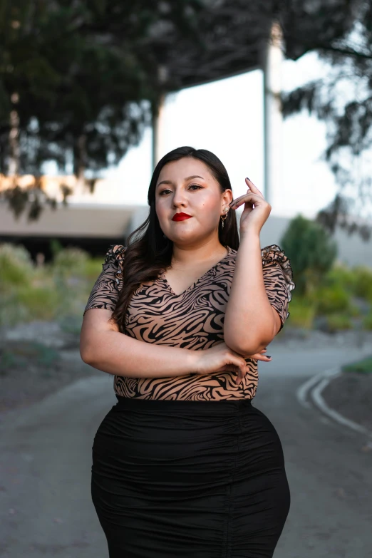 woman posing for a po in a black skirt