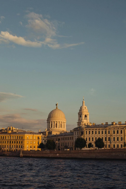 the building has many windows and dome tops