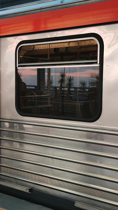 the view through the window of a commuter train