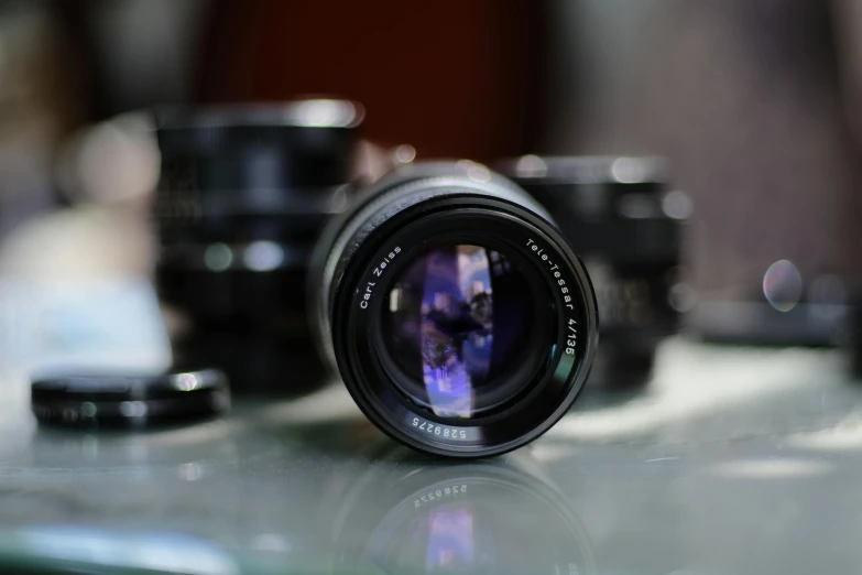 a close up of an empty lens sitting on a table