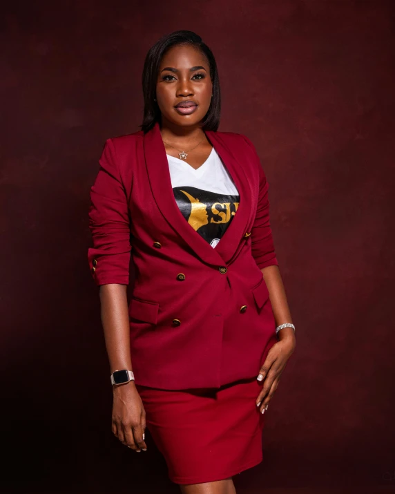 a woman in a red suit, white tee and red skirt