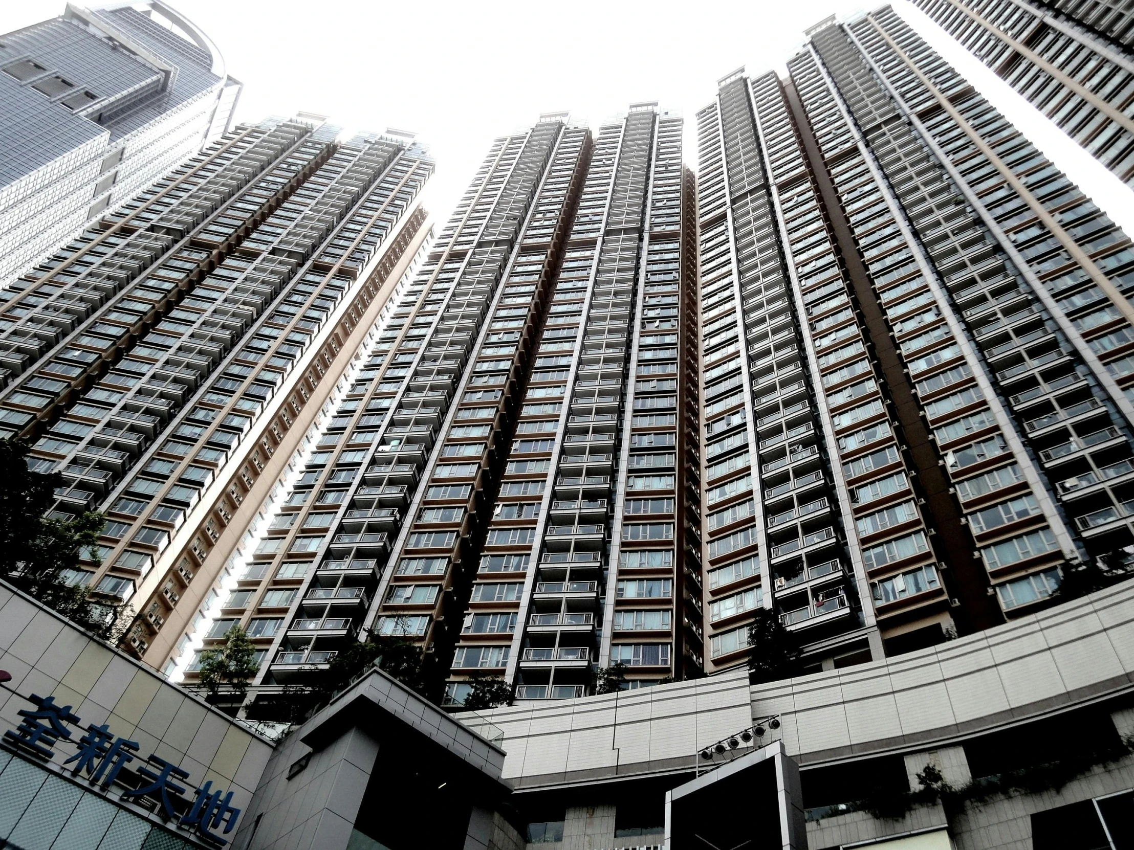 a high rise building in a city filled with tall buildings