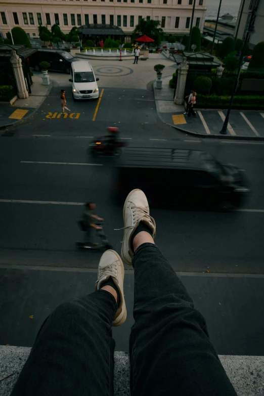 a person is seen standing in the middle of a city street