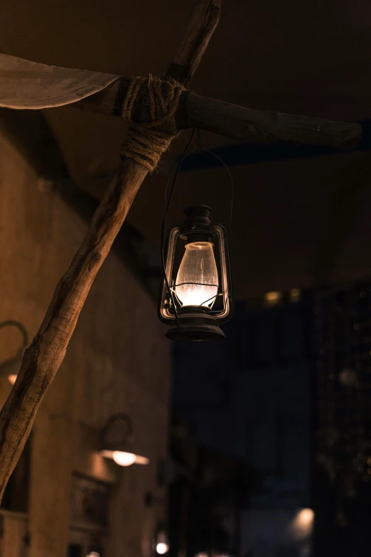 a close up of a lit lamp on a light fixture