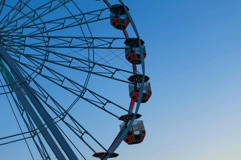 a ferris wheel is on top of the building