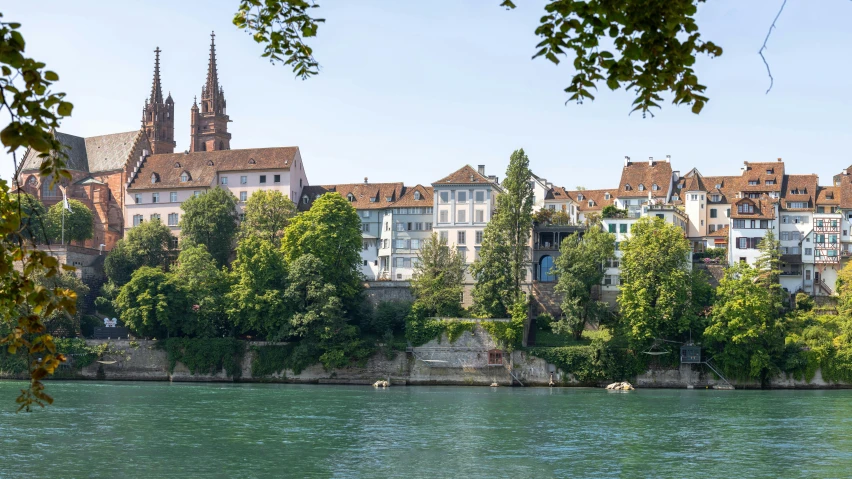 the view over the water has many buildings with towers