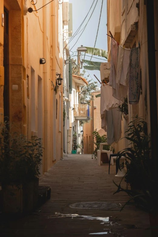 this is an alley with clothes hanging on the line