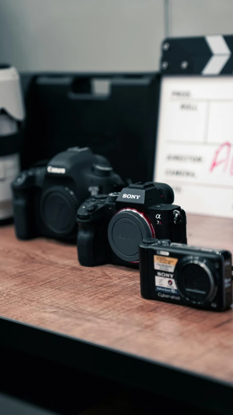 some black and white camera on a table