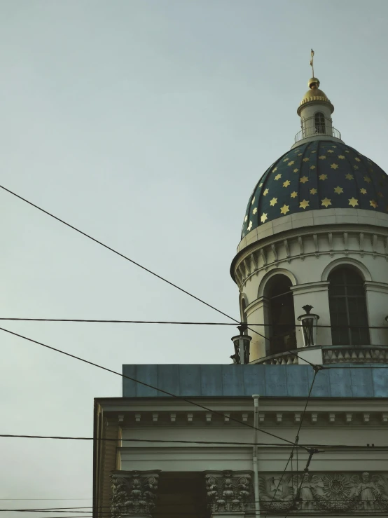 a dome with a star pattern and a clock on top